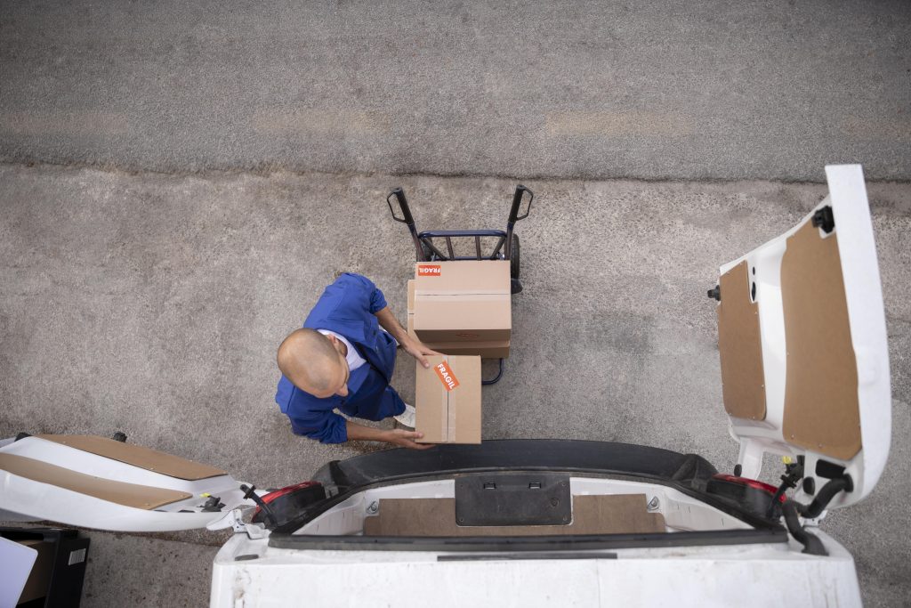 Delivery with man holding box